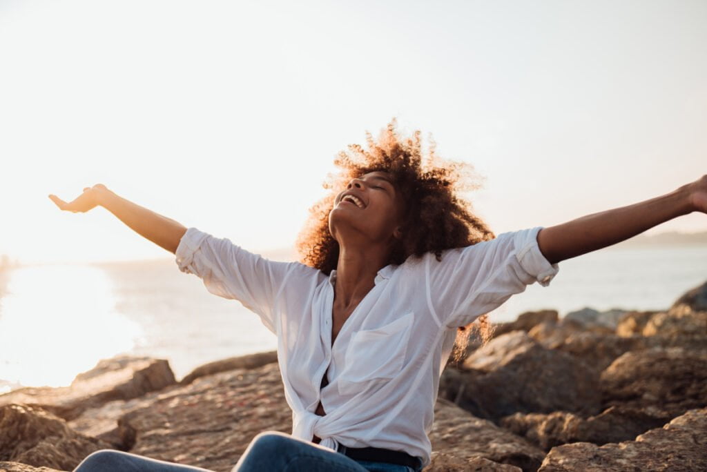 Woman Rasises Arms Happily After Basu Beautiful Arm Lift