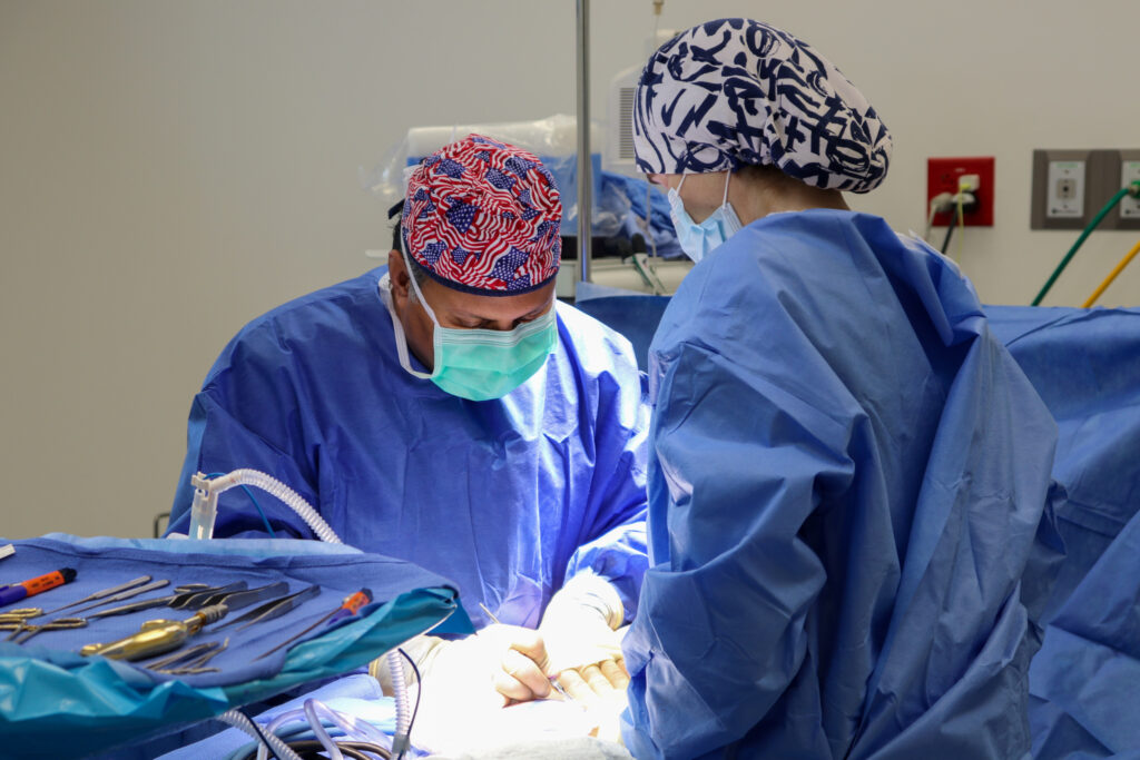 Dr. Bob Basu performing a plastic surgery procedure at his Houston plastic surgery practice