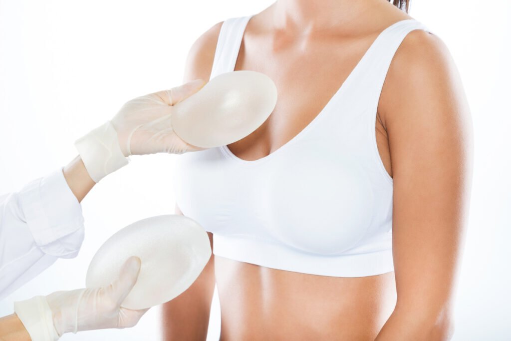Woman at Houston breast augmentation consultation with a board certified plastic surgeon