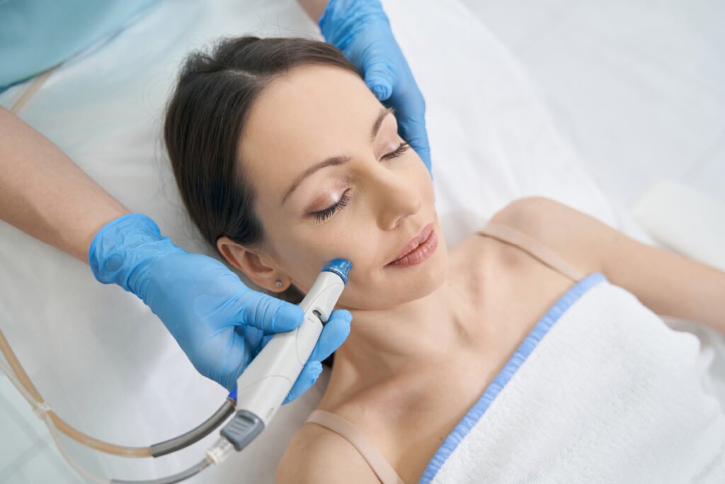 Woman getting a Hydrafacial treatment at a Houston med spa
