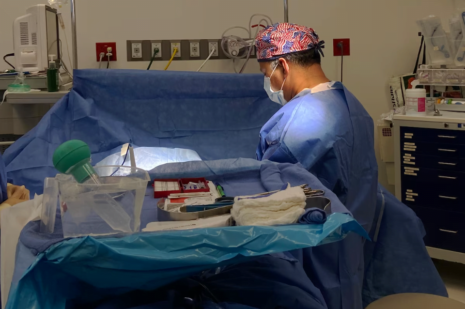 Houston plastic surgeon Dr. Bob Basu performing a plastic surgery procedure